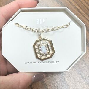 Gold and Silver Necklace by [Brand]